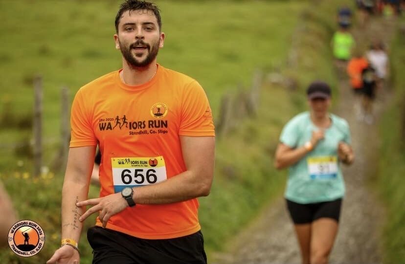 Dan running the Warriors Run trail race in Strandhill, Sligo